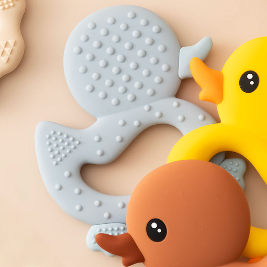 Mordedor de silicona con dibuj - Baby Products Expo reseña y precio